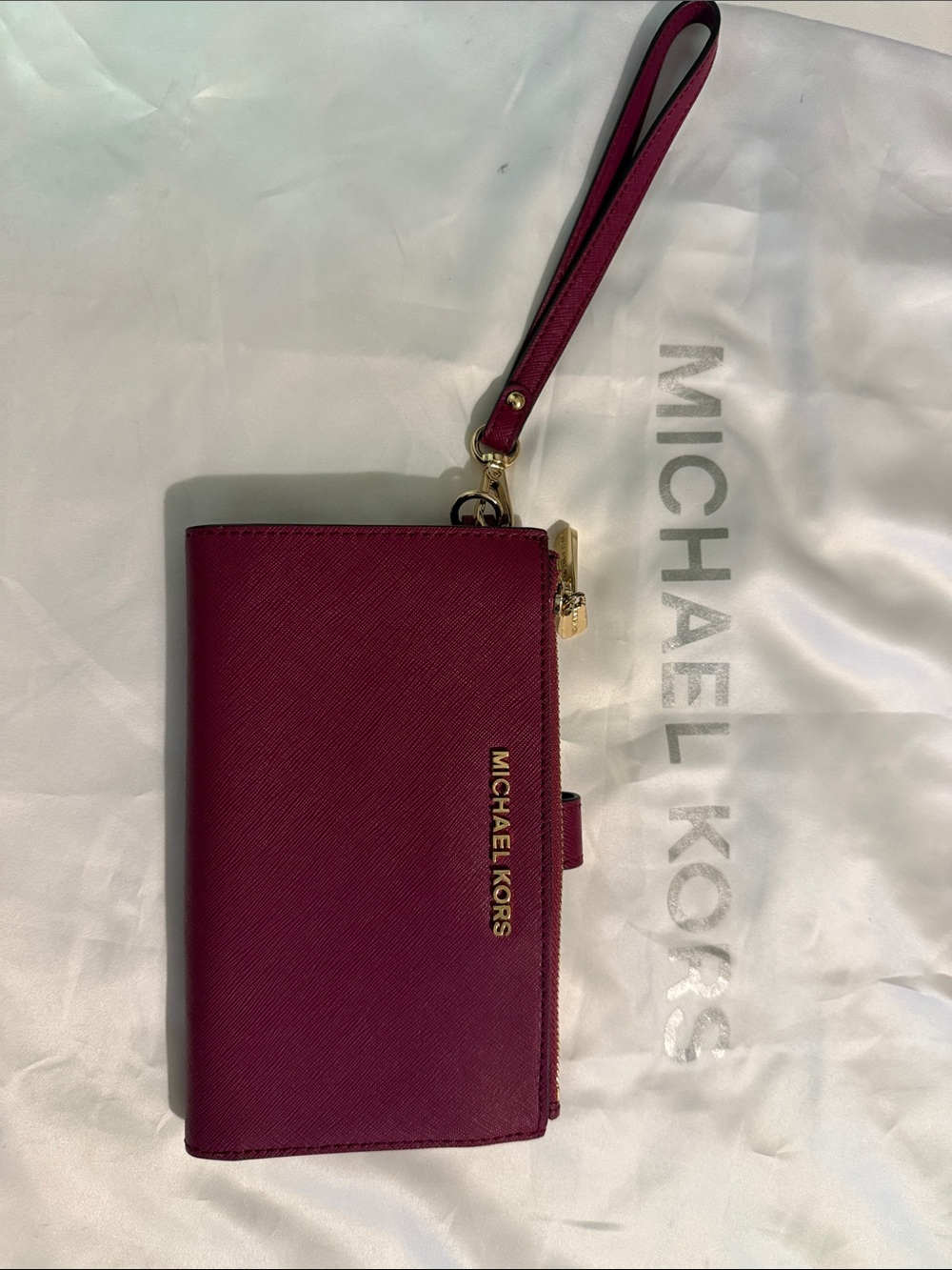 Michael Kors Pink Wristlet Phone Case with Gold Hardware